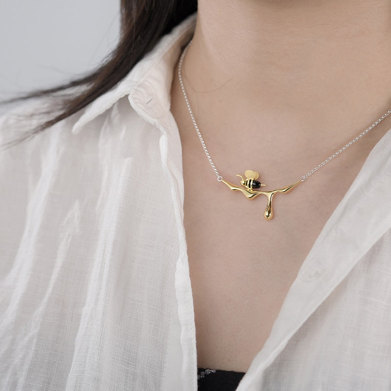 Model wearing Bee and Honey necklace