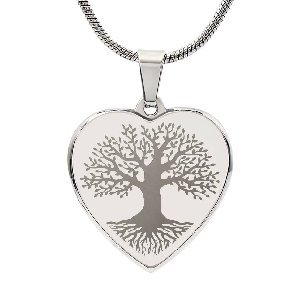 Heart Tree of Life Necklace. Heart shaped pendant with tree of life etched design.